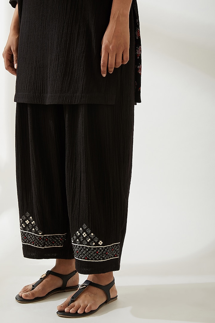 Black Geometric & Floral Embroidered Trousers by VIAM at Pernia's Pop Up Shop