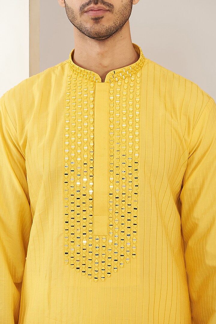 Haldi Yellow Cotton Blend Mirror Embroidered Kurta Set by VICUGNA at Pernia's Pop Up Shop