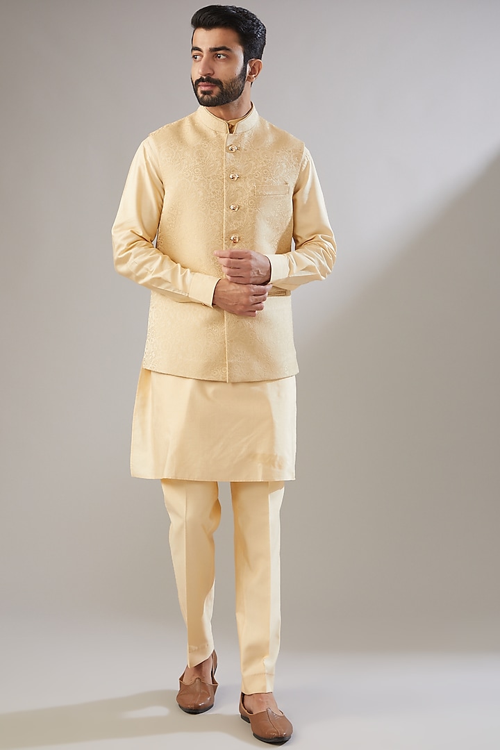 Gold Silk Kurta Set With Nehru Jacket by VICUGNA