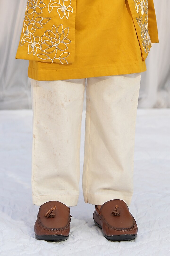 Mustard Yellow Silk Chanderi Cutdana Hand Embroidered Jacket Set For Boys by Vibrant Hues at Pernia's Pop Up Shop