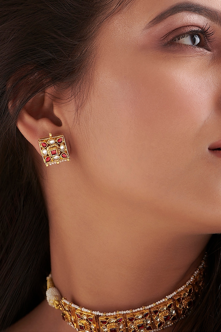 Gold Finish Ruby Stone & Kundan Polki Stud Earrings In Sterling Silver by Vinanti Manji at Pernia's Pop Up Shop