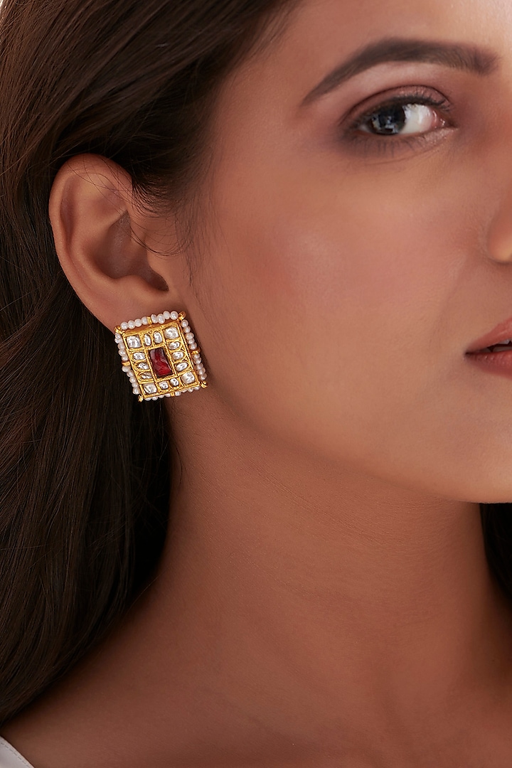 Gold Finish Ruby Stone & Kundan Polki Stud Earrings In Sterling Silver by Vinanti Manji at Pernia's Pop Up Shop
