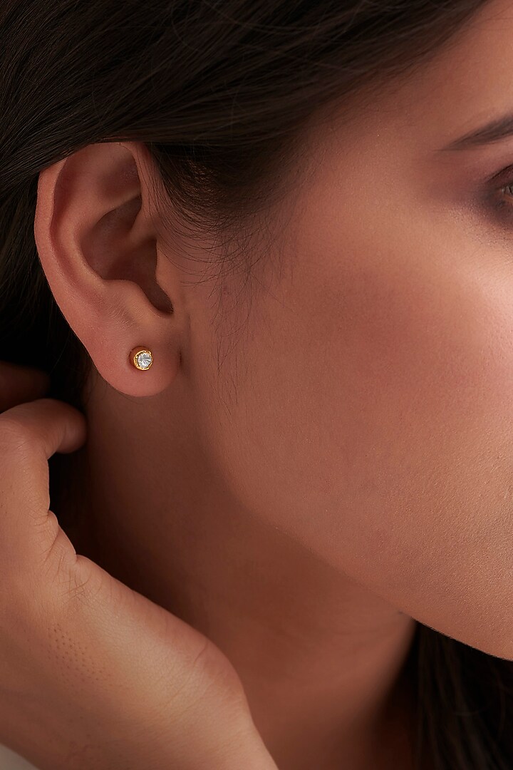 Gold Finish Diamond Stud Earrings In Sterling Silver by Vinanti Manji at Pernia's Pop Up Shop
