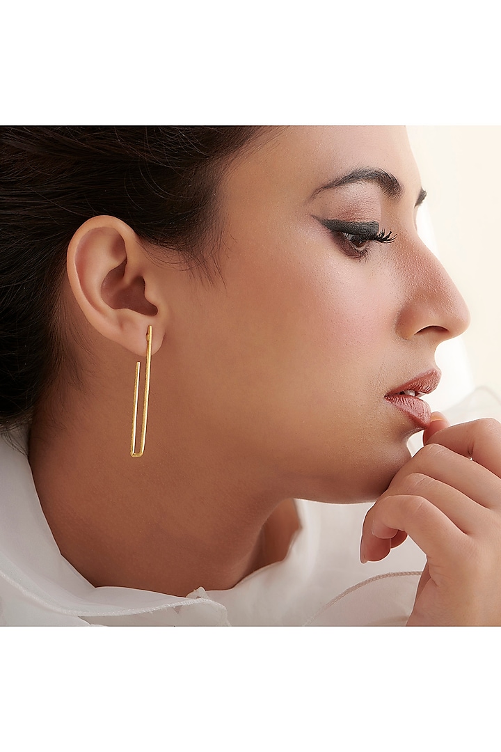 Gold Finish J-Shaped Hoop Earrings In Sterling Silver by Vinanti Manji at Pernia's Pop Up Shop