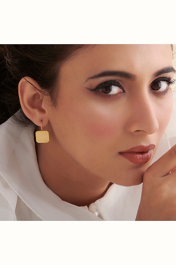 Gold Finish Hoop Earrings In Sterling Silver by Vinanti Manji at Pernia's Pop Up Shop