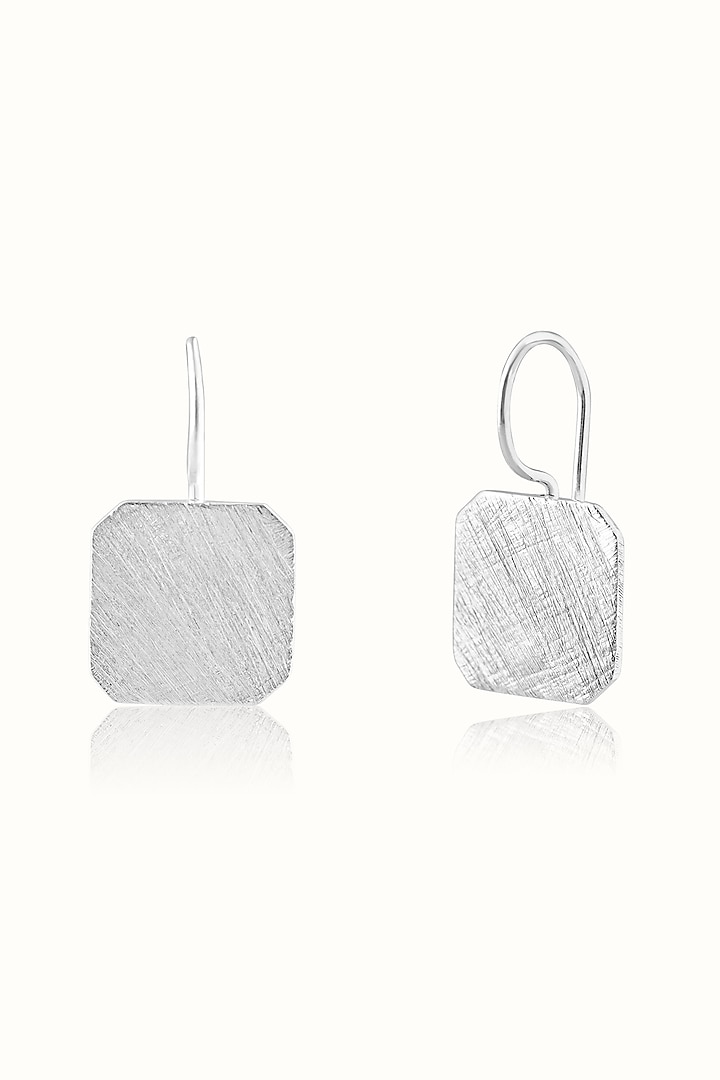 White Finish Hoop Earrings In Sterling Silver by Vinanti Manji at Pernia's Pop Up Shop