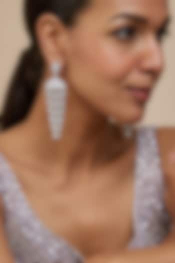 White Finish Zircon Jhumka Earrings by Vivinia By Vidhi Mehra