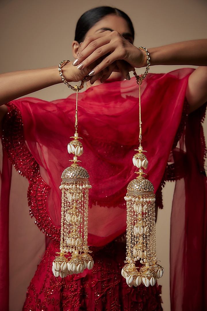 Gold Finish Shell Charm Tying Kaleeras (Set Of 2) by Vivinia By Vidhi Mehra