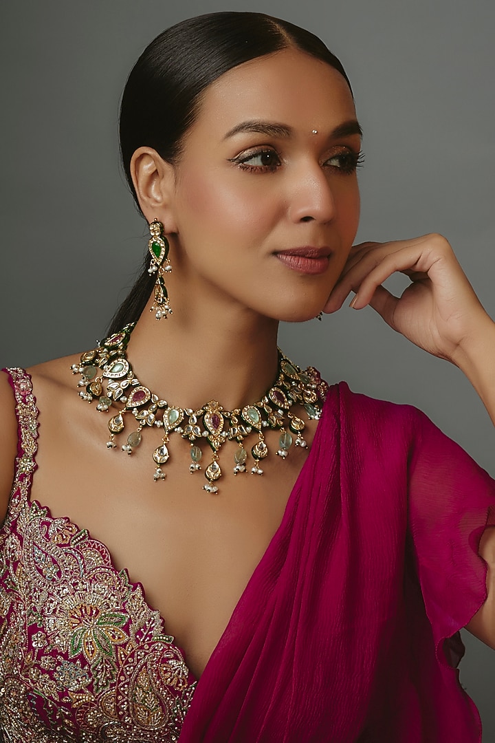 Gold Finish Kundan Polki & Synthetic Stone Necklace Set by Vivinia By Vidhi Mehra at Pernia's Pop Up Shop