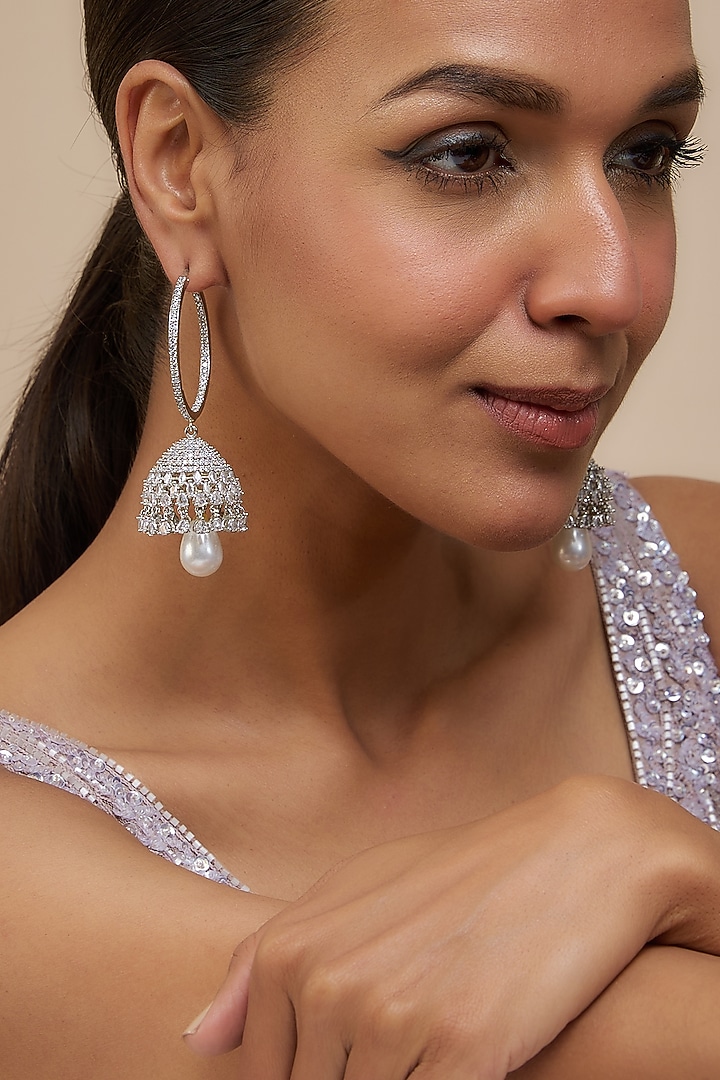 White Finish Zircon & Pearl Jhumka Earrings by Vivinia By Vidhi Mehra at Pernia's Pop Up Shop