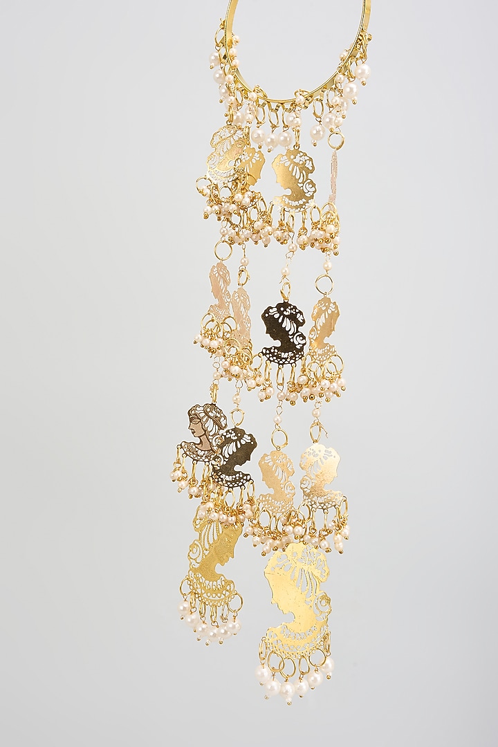 Gold Finish Shell & Face Charm Bangle Kaleeras (Set Of 2) by Vivinia By Vidhi Mehra at Pernia's Pop Up Shop