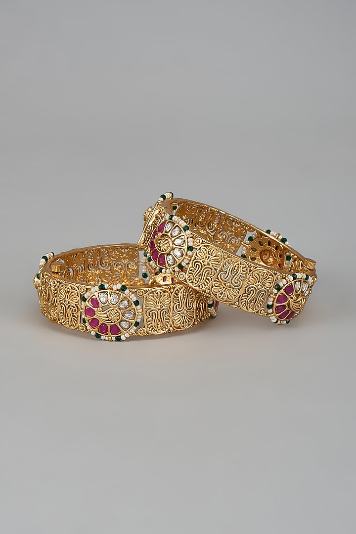 Gold Finish Onyx Stone Bangles (Set Of 2) by Vivinia By Vidhi Mehra at Pernia's Pop Up Shop
