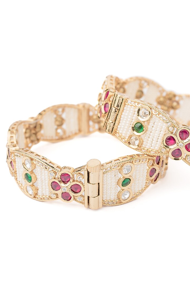 Gold Finish Pink & Green Gemstone Beaded Bangles (Set Of 2) by Vivinia By Vidhi Mehra at Pernia's Pop Up Shop