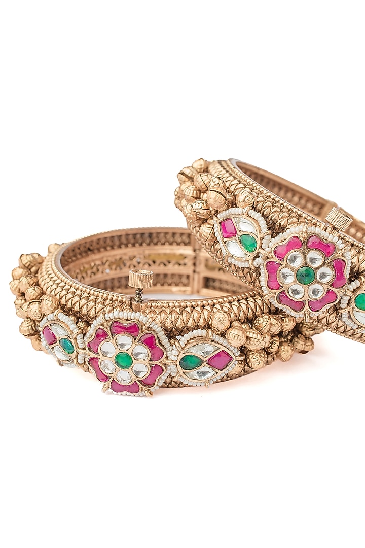 Gold Finish Ruby Stone & Diamond Floral Motif Bangles (Set Of 2) by Vivinia By Vidhi Mehra at Pernia's Pop Up Shop