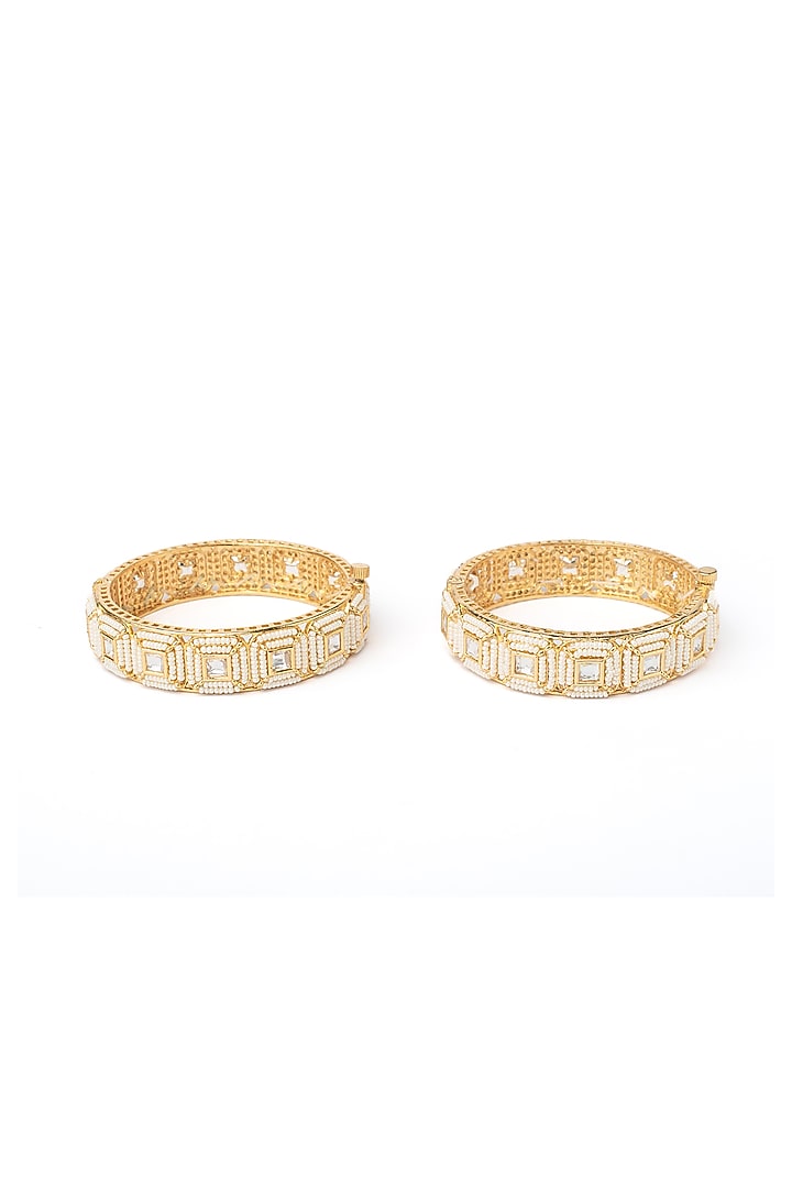 Gold Finish White Stone Beaded Bangles (Set Of 2) by Vivinia By Vidhi Mehra at Pernia's Pop Up Shop