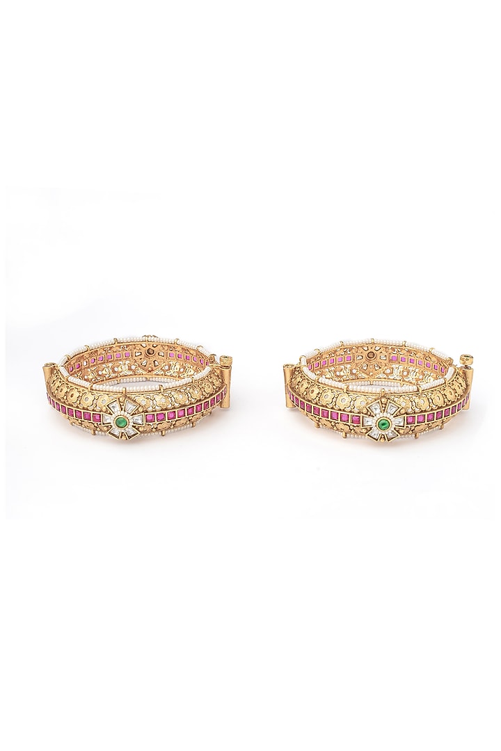 Gold Finish Green & Pink Stone Temple Floral Bangles (Set Of 2) by Vivinia By Vidhi Mehra at Pernia's Pop Up Shop