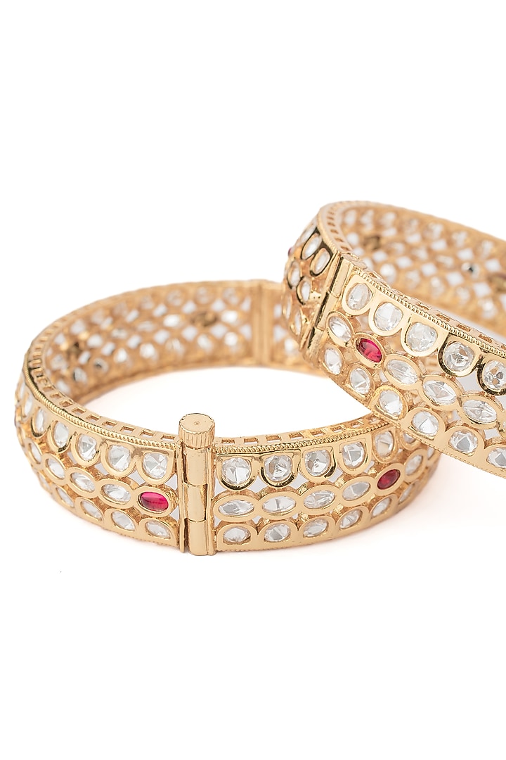 Gold Finish Kundan Polki Floral Bangles (Set Of 2) by Vivinia By Vidhi Mehra at Pernia's Pop Up Shop