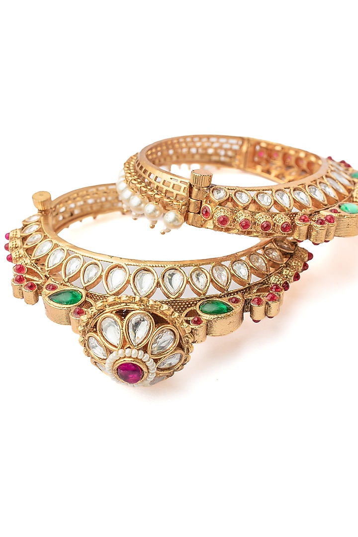 Gold Finish Multi-Colored Stone Floral Bangles (Set Of 2) by Vivinia By Vidhi Mehra at Pernia's Pop Up Shop