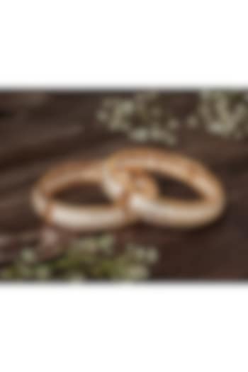 Gold Finish Kundan Polki & Square-Cut Stone Bangles (Set Of 2) by Vivinia By Vidhi Mehra at Pernia's Pop Up Shop