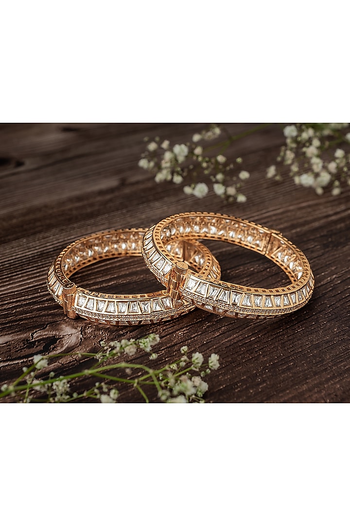 Gold Finish Kundan Polki & Square-Cut Stone Bangles (Set Of 2) by Vivinia By Vidhi Mehra at Pernia's Pop Up Shop