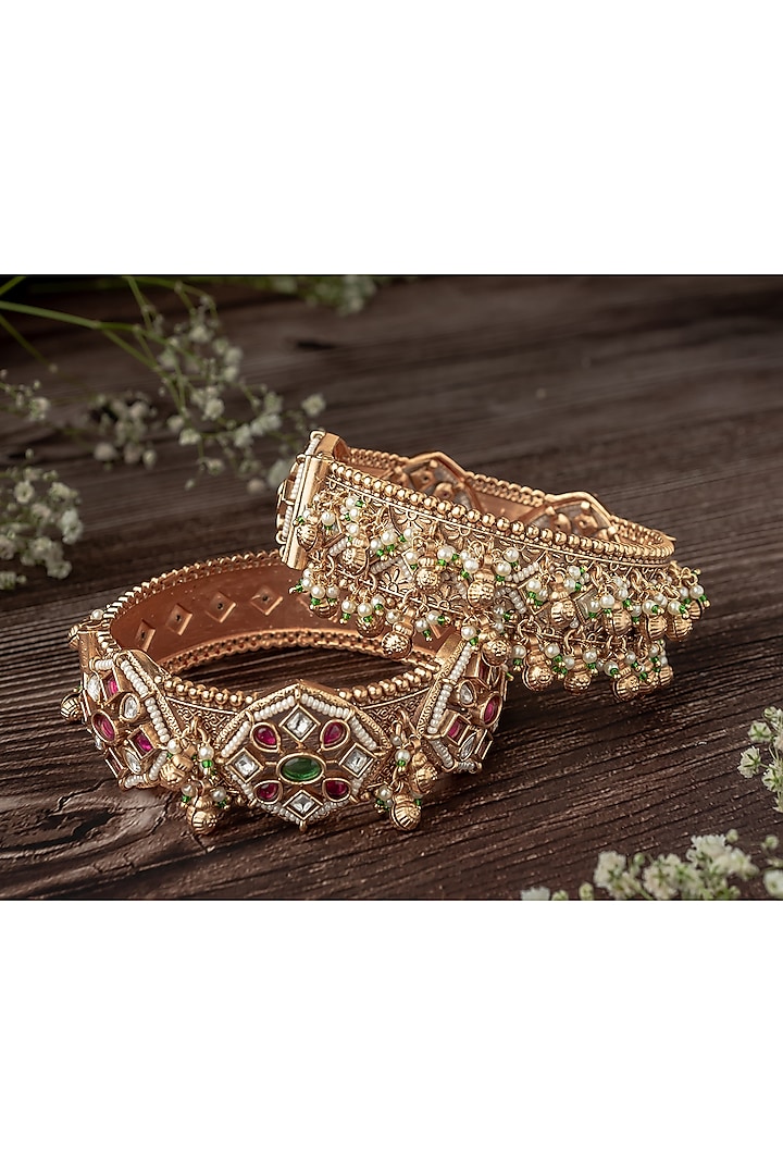 Gold Finish Multi-Colored-Stone Temple Bangles (Set Of 2) by Vivinia By Vidhi Mehra at Pernia's Pop Up Shop
