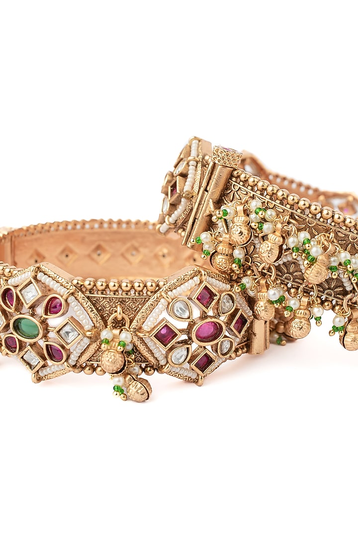 Gold Finish Multi-Colored-Stone Temple Bangles (Set Of 2) by Vivinia By Vidhi Mehra at Pernia's Pop Up Shop