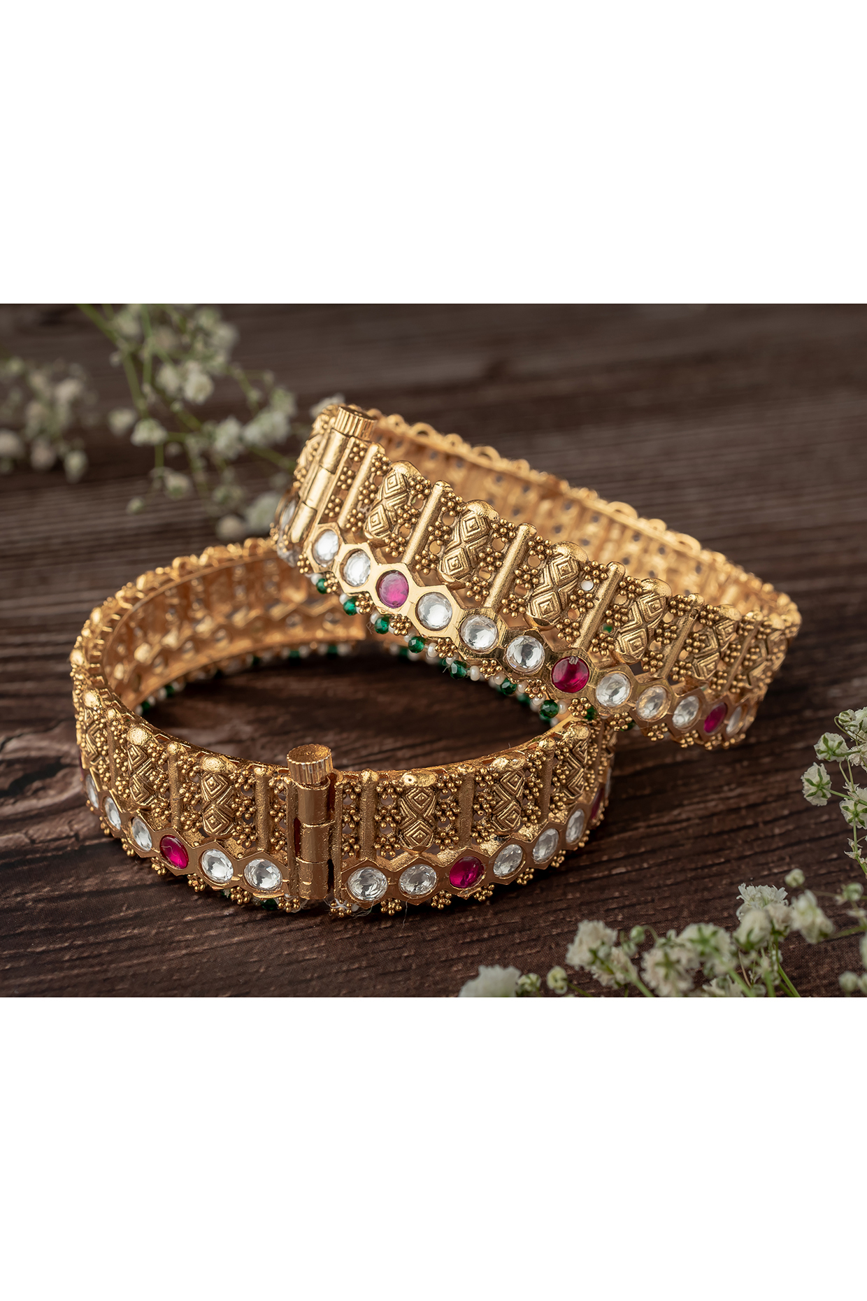 Gold Finish Multi-Colored Stone Temple Bangles (Set Of 2) by Vivinia By Vidhi Mehra at Pernia's Pop Up Shop