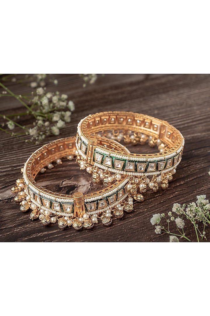 Gold Finish Kundan Polki & Gold Beaded Green Enameled Bangles (Set Of 2) by Vivinia By Vidhi Mehra at Pernia's Pop Up Shop