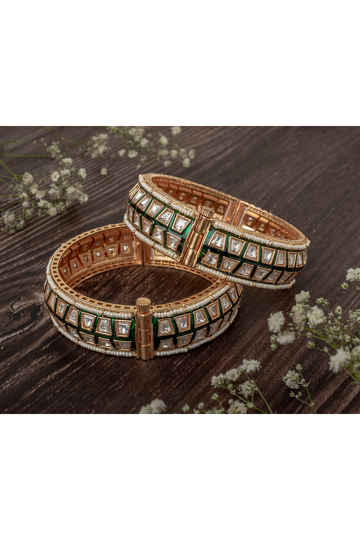 Gold Finish Kundan Polki & Green Stone Bangles (Set Of 2) by Vivinia By Vidhi Mehra at Pernia's Pop Up Shop