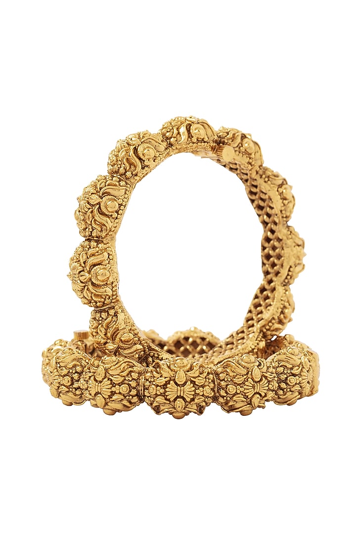 Gold Finish Textured Bangles (Set Of 2) by Vivinia By Vidhi Mehra at Pernia's Pop Up Shop