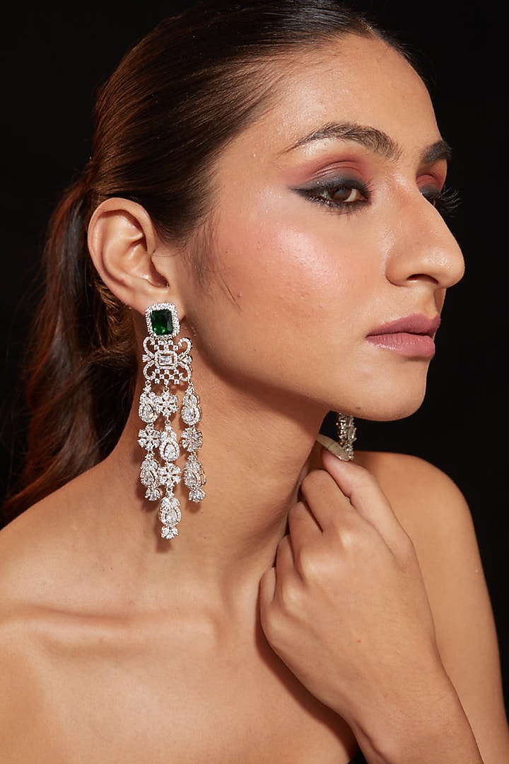Silver Finish Zircon & Emerald Stone Statement Earrings by Vivinia By Vidhi Mehra at Pernia's Pop Up Shop