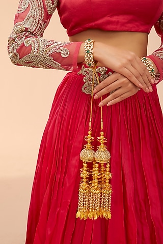 Gold Finish Shell Charms & Pearl Kaleeras (Set Of 2) by Vivinia By Vidhi Mehra