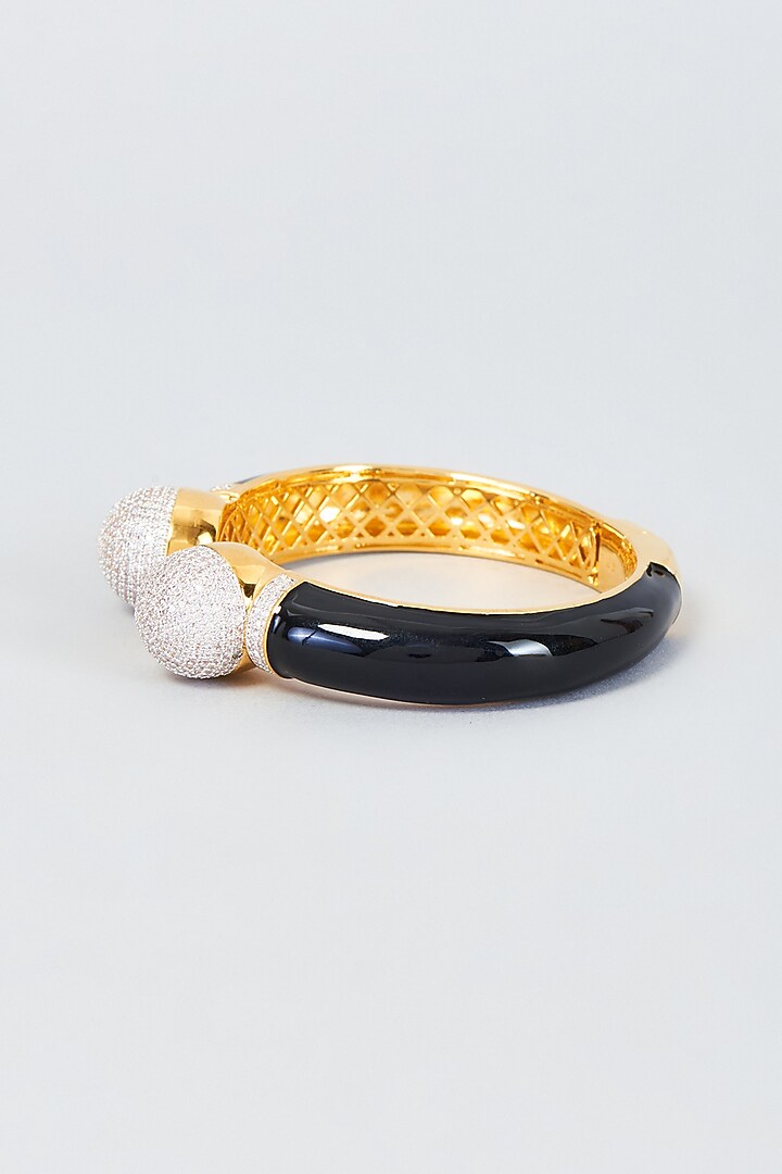 Gold Finish Zircon Bangle by Vivinia By Vidhi Mehra at Pernia's Pop Up Shop