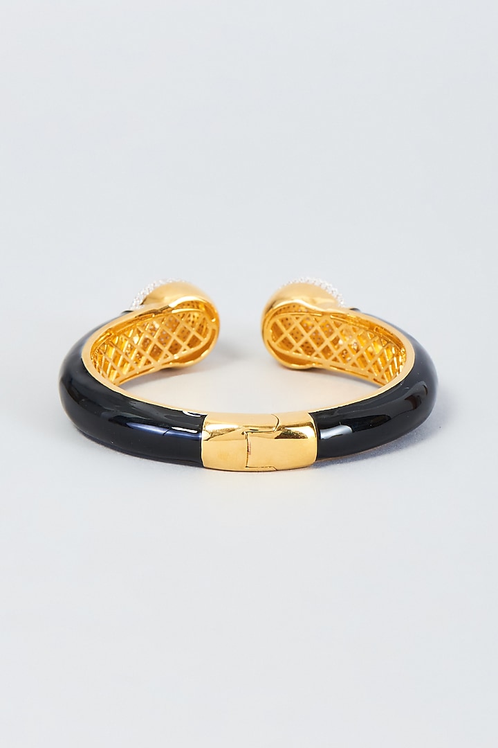 Gold Finish Zircon Bangle by Vivinia By Vidhi Mehra at Pernia's Pop Up Shop