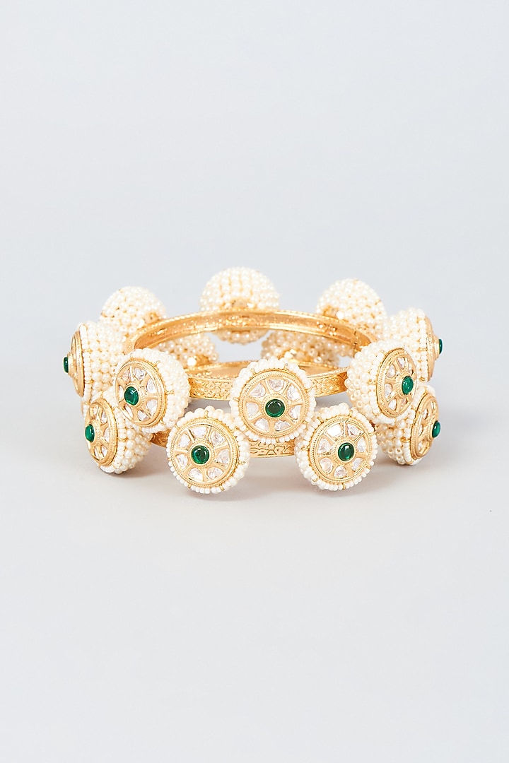 Gold Finish Pearl Bangles (Set Of 2) by Vivinia By Vidhi Mehra at Pernia's Pop Up Shop