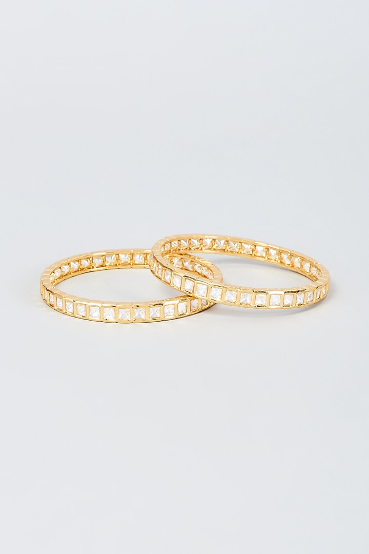 Gold Finish Kundan Polki Bangles (Set Of 2) by Vivinia By Vidhi Mehra at Pernia's Pop Up Shop