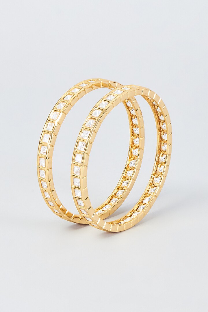 Gold Finish Kundan Polki Bangles (Set Of 2) by Vivinia By Vidhi Mehra at Pernia's Pop Up Shop