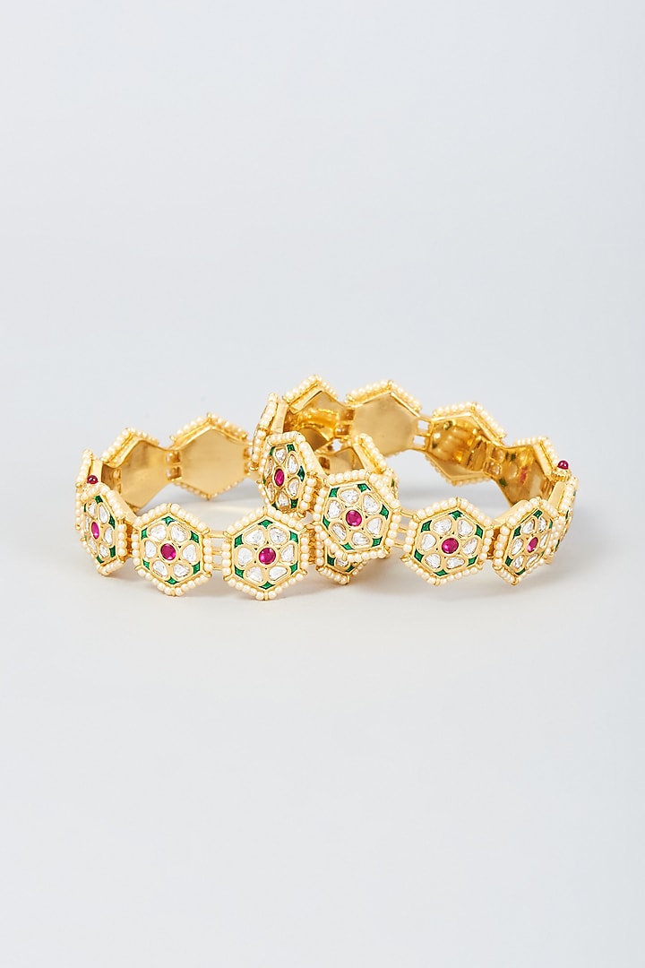 Gold Finish Kundan Polki & Pearl Bangles (Set Of 2) by Vivinia By Vidhi Mehra at Pernia's Pop Up Shop