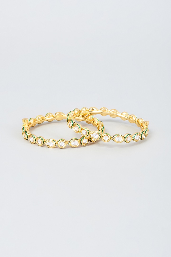 Gold Finish Kundan Polki Bangles (Set Of 2) by Vivinia By Vidhi Mehra at Pernia's Pop Up Shop