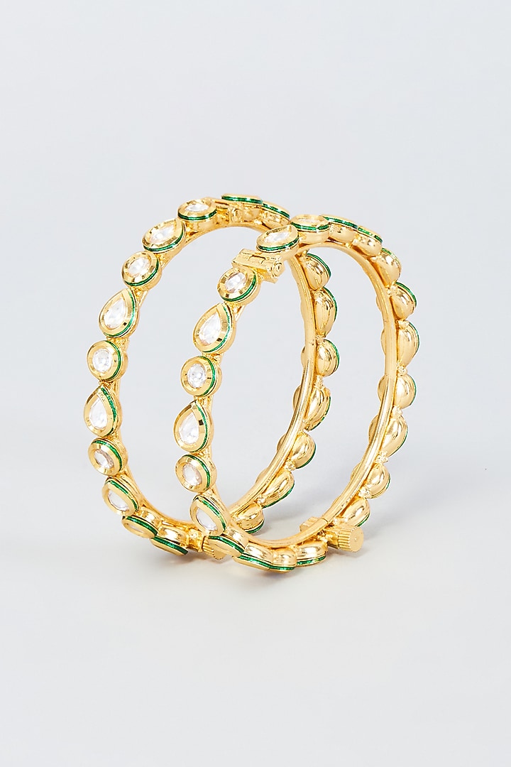 Gold Finish Kundan Polki Bangles (Set Of 2) by Vivinia By Vidhi Mehra at Pernia's Pop Up Shop