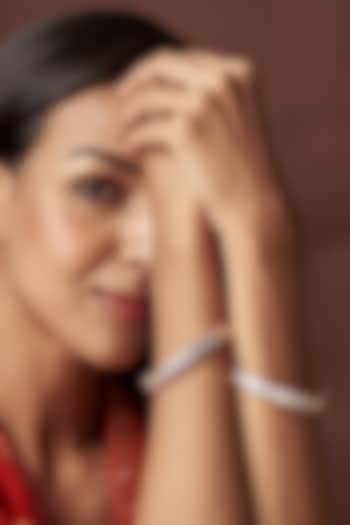 Rose Gold Finish Zircon Bangles (Set Of 2) by Vivinia By Vidhi Mehra at Pernia's Pop Up Shop