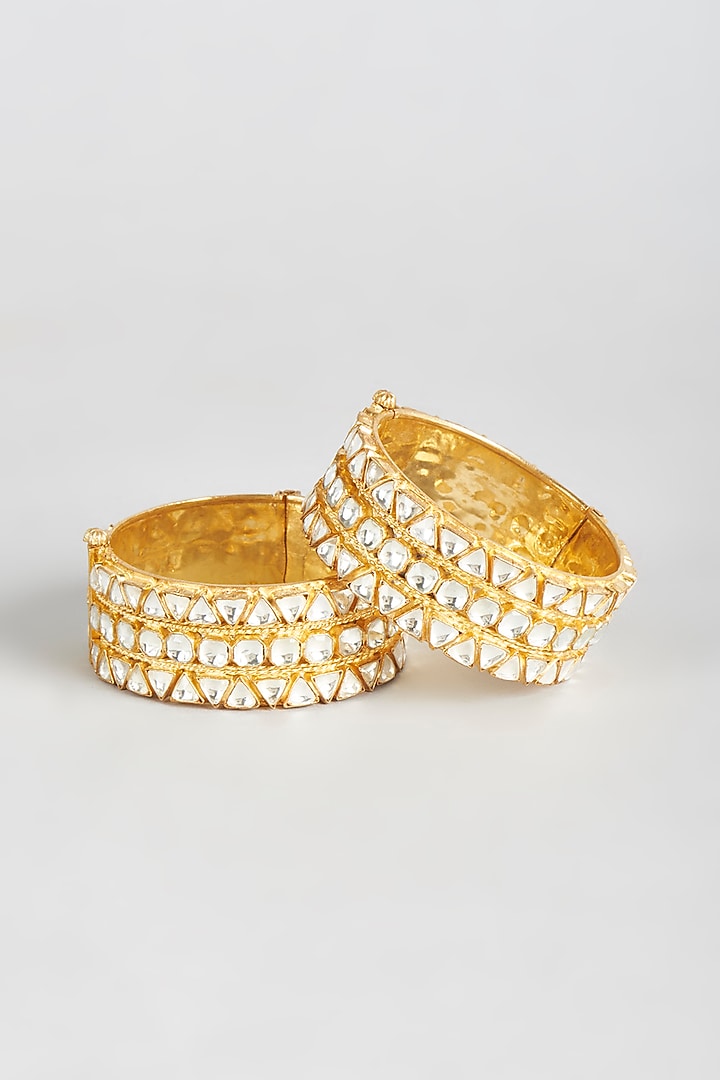 Gold Finish Kundan Polki Bangles (Set of 2) by Vivinia By Vidhi Mehra at Pernia's Pop Up Shop