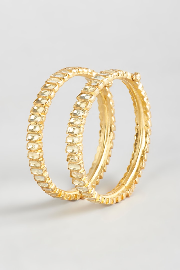 Gold Finish Kundan Polki Bangles (Set of 2) by Vivinia By Vidhi Mehra at Pernia's Pop Up Shop