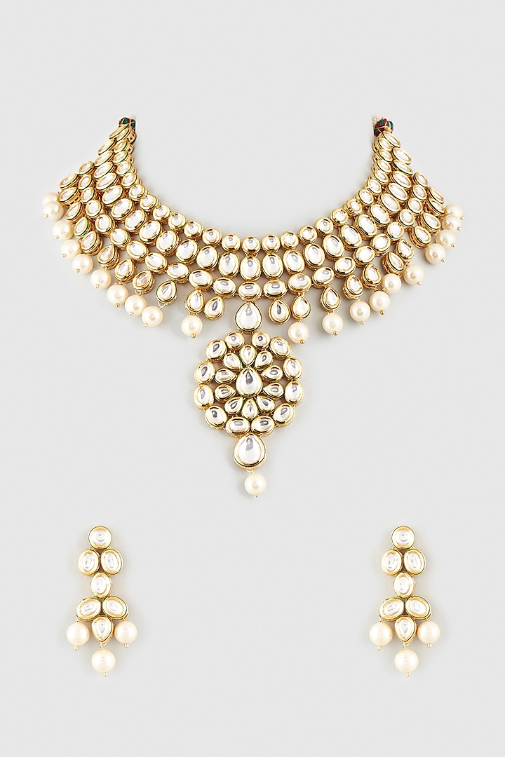 Gold Finish Kundan Polki Necklace Set In Mixed Metal by Vivinia By Vidhi Mehra