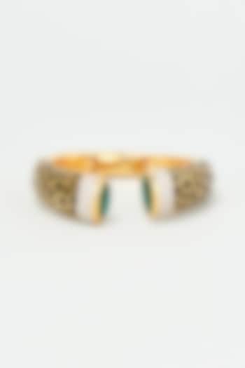 Gold Finish Zircon & Green Synthetic Stone Enameled Bangle by Vivinia By Vidhi Mehra at Pernia's Pop Up Shop