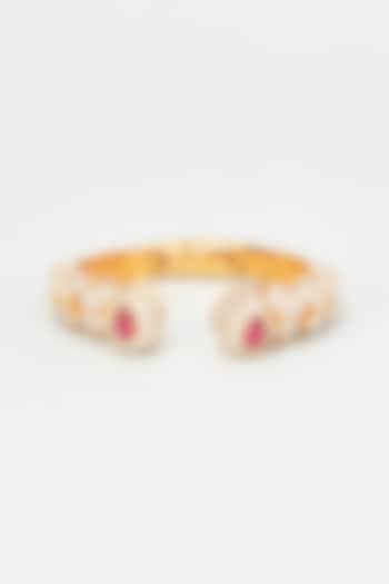 Gold Finish Zircon Bangle by Vivinia By Vidhi Mehra at Pernia's Pop Up Shop