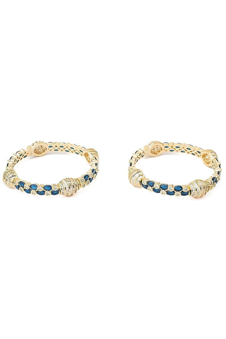 Gold Finish Kundan Polki & Deep Blue Gemstone Bangles (Set Of 2) by Vivinia By Vidhi Mehra at Pernia's Pop Up Shop