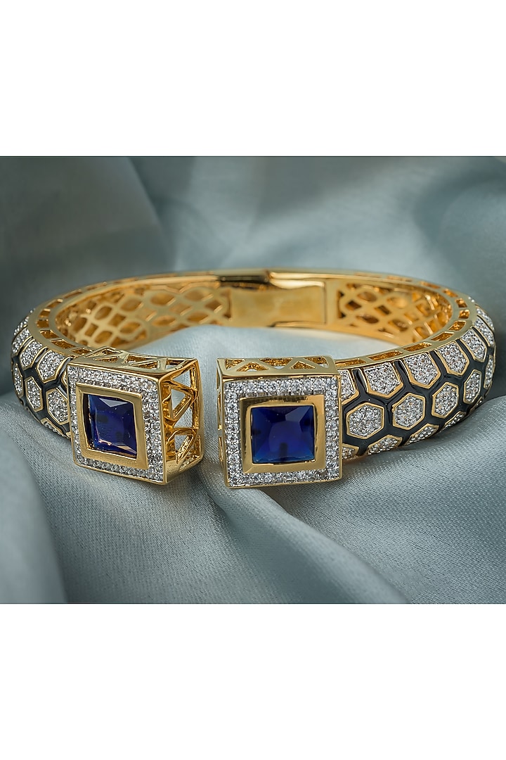 Gold Finish Blue Gemstone Floral Cuff Kada by Vivinia By Vidhi Mehra at Pernia's Pop Up Shop