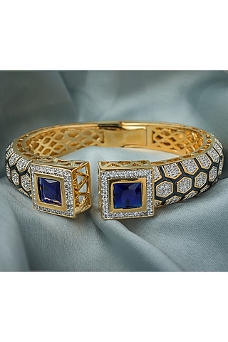 Gold Finish Blue Gemstone Floral Cuff Kada by Vivinia By Vidhi Mehra