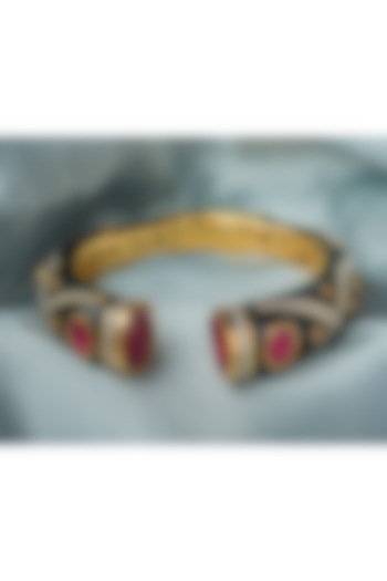 Gold Finish Red Gemstone Black Enameled Floral Cuff Kada by Vivinia By Vidhi Mehra at Pernia's Pop Up Shop